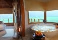 Sunset Water Villa Bed and Bath.jpg